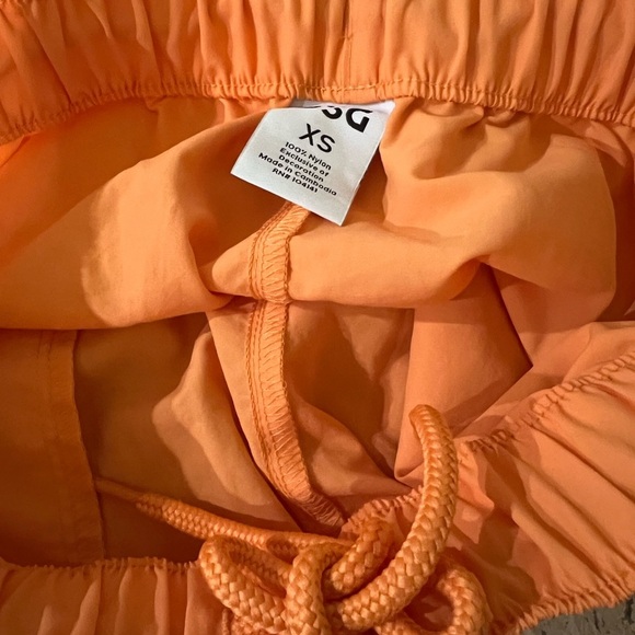 DSG Women's Notched Woven Athletic Shorts Size XS Orange - Picture 7 of 7